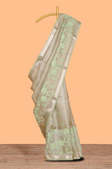 Moss green floral design art tissue saree with zari border and Plain blouse