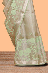 Moss green floral design art tissue saree with zari border and Plain blouse
