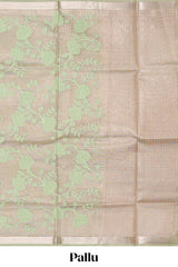 Moss green floral design art tissue saree with zari border and Plain blouse
