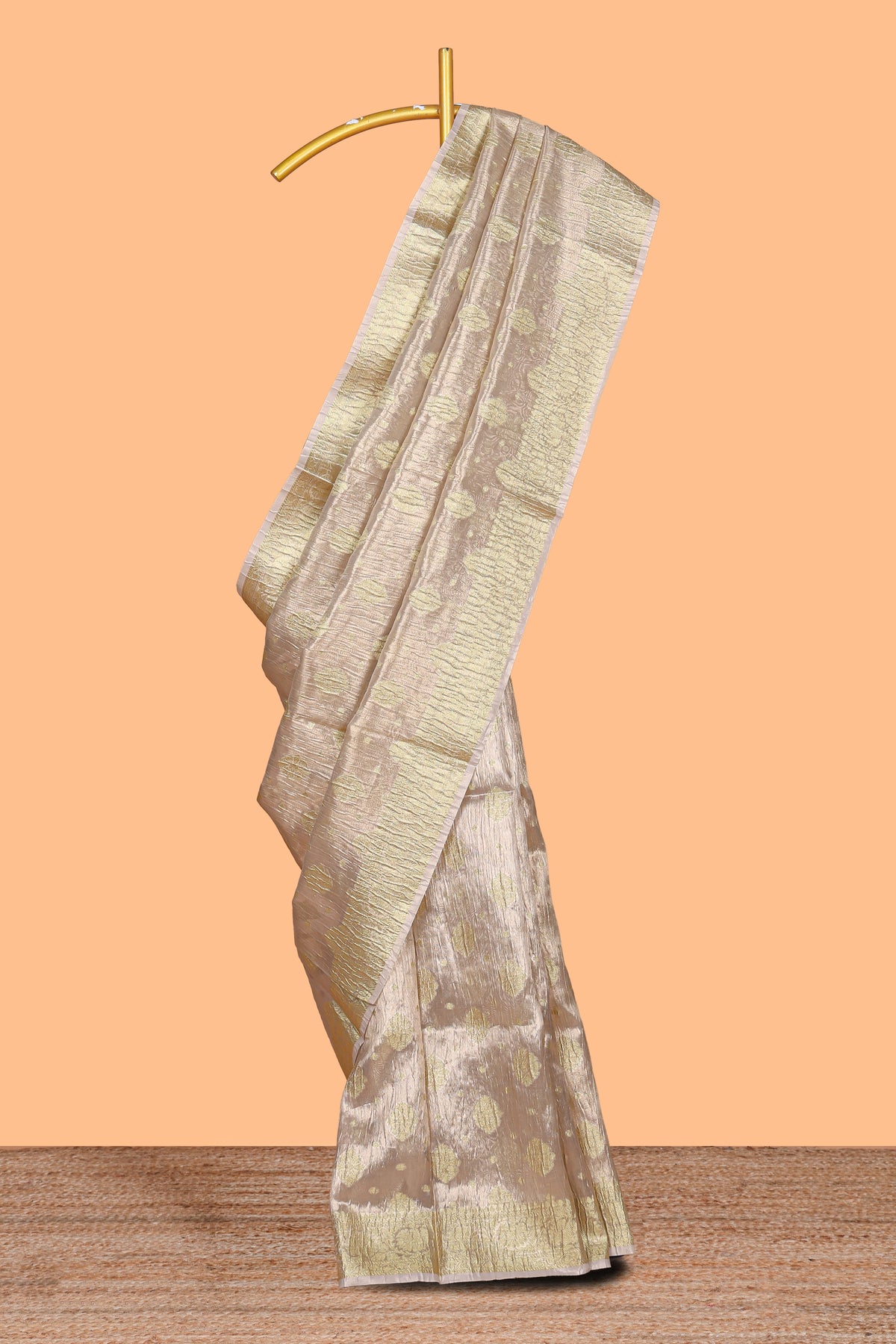 Rose gold color butta designs art tissue saree with zari border and plain blouse