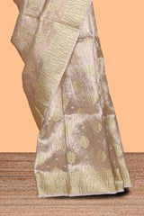 Rose gold color butta designs art tissue saree with zari border and plain blouse