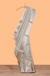 Silver grey shade geometric design art tissue saree with zari border and bouse
