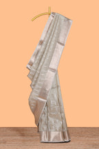 Silver grey shade geometric design art tissue saree with zari border and bouse