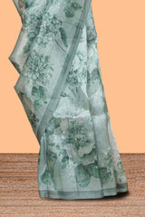 Borderless bottle green floral design art tissue saree with self pallu and floral blouse