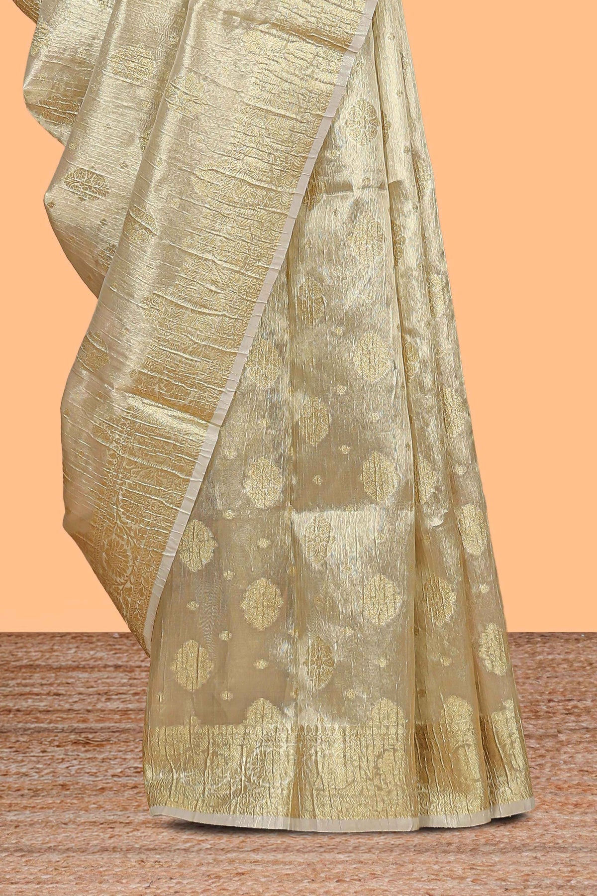 Gold color zari butta design art tissue saree with self zari border and Matching blouse