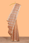 Copper geometric and floral motifs art tissue saree with self zari border and contrastr blouse