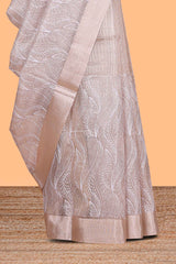 Pearl Ivory flowing leaf and wavy vine pattern art tissue saree with self zari border and contrastr blouse