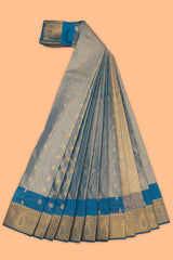 Steel blue motifs design tissue saree with contrast border and matching blouse
