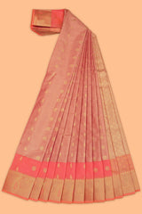 Peach motifs design tissue saree with contrast border and matching blouse