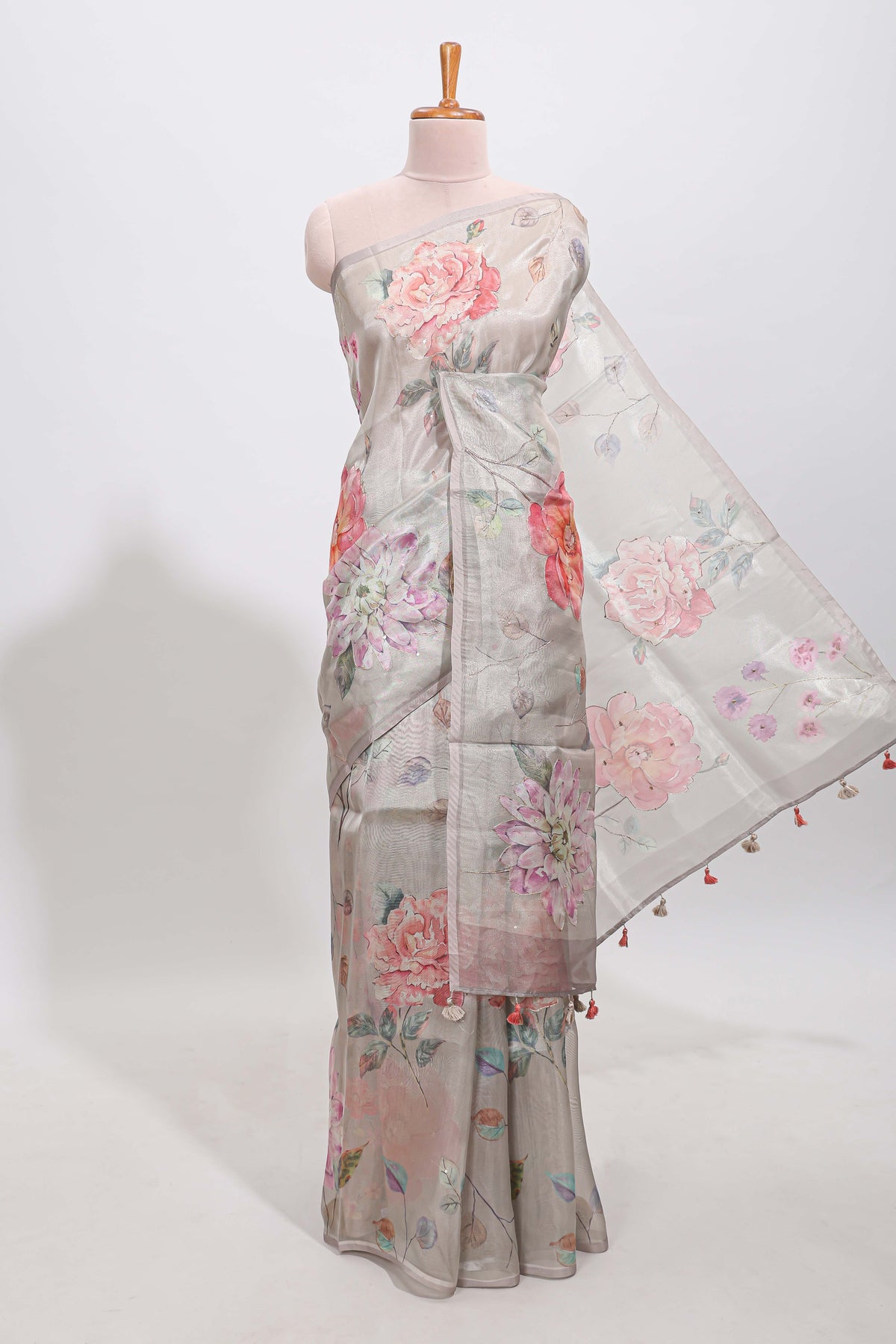 Borderless grey floral designed art tissue saree with self pallu and matching blouse