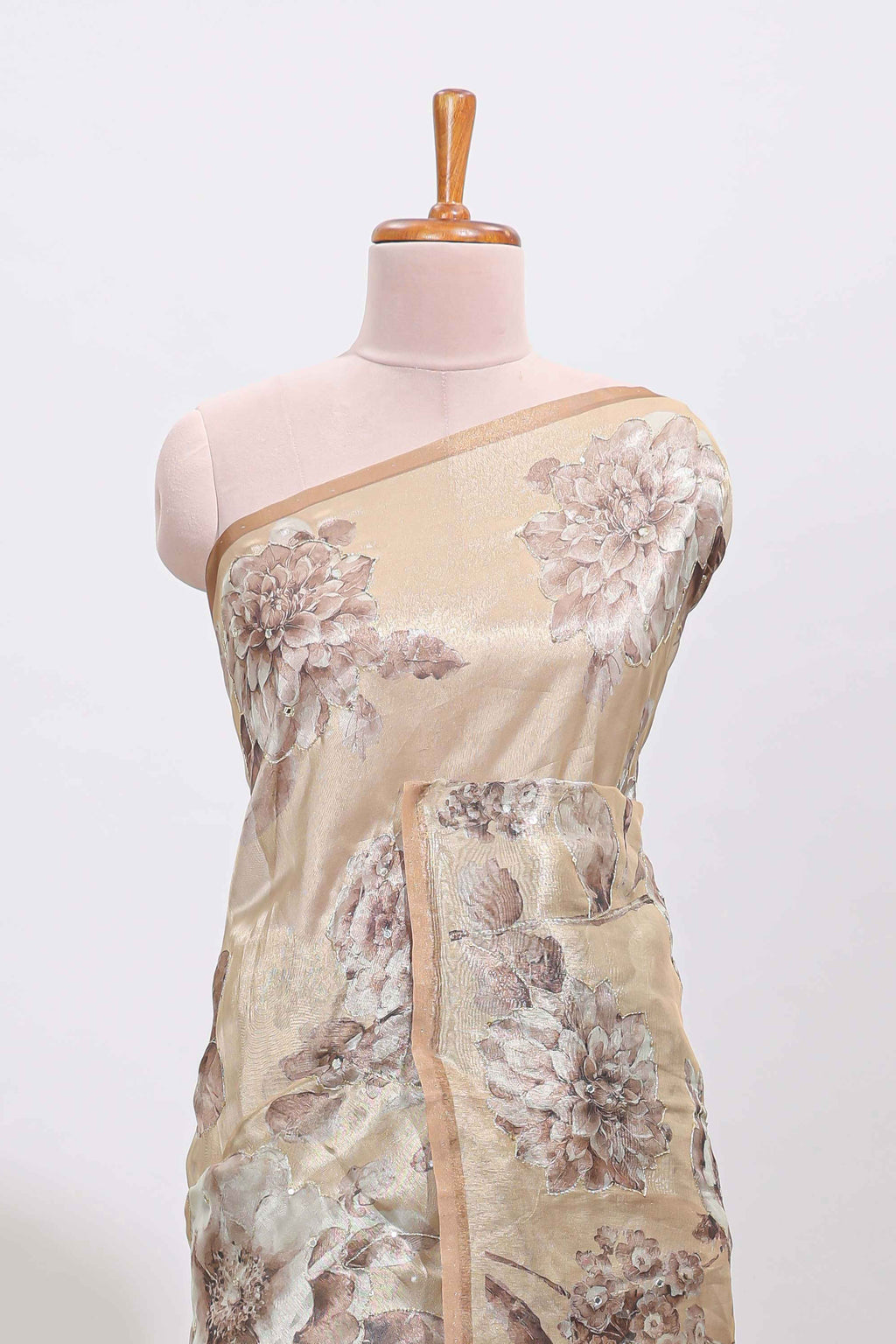 Borderless beige floral designed art tissue saree with self pallu and matching blouse