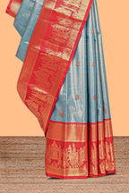 Light blue geometric checked  floral motifs design with contrast palak zari design border and blouse