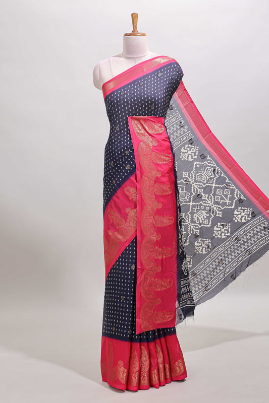 Blue floral design zari butta dola silk saree with contrast floral zari design border and ikkat style pallu