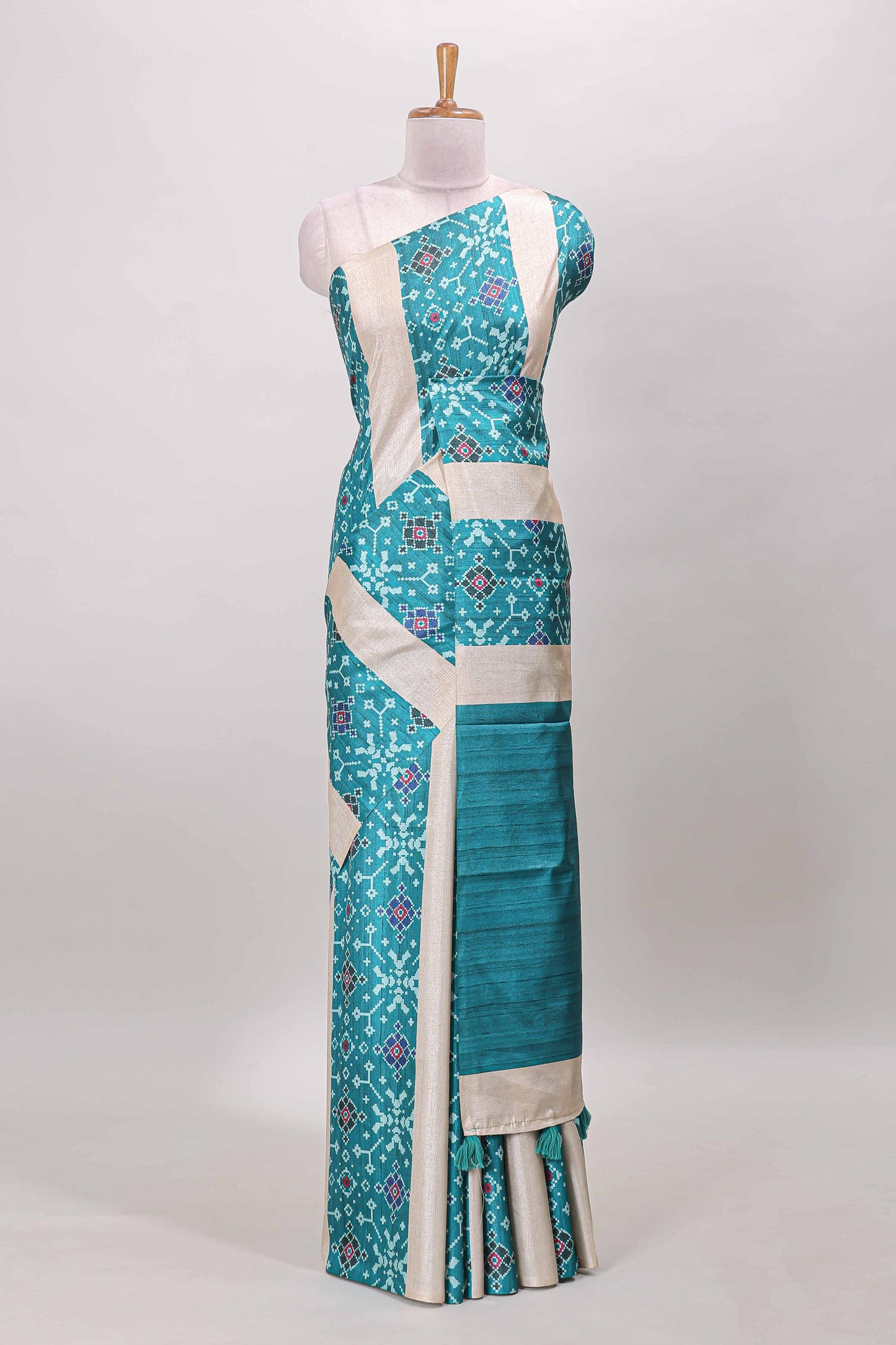 Borderless turquoise green block stripes ikkat style tussar saree with self pallu and matching blouse