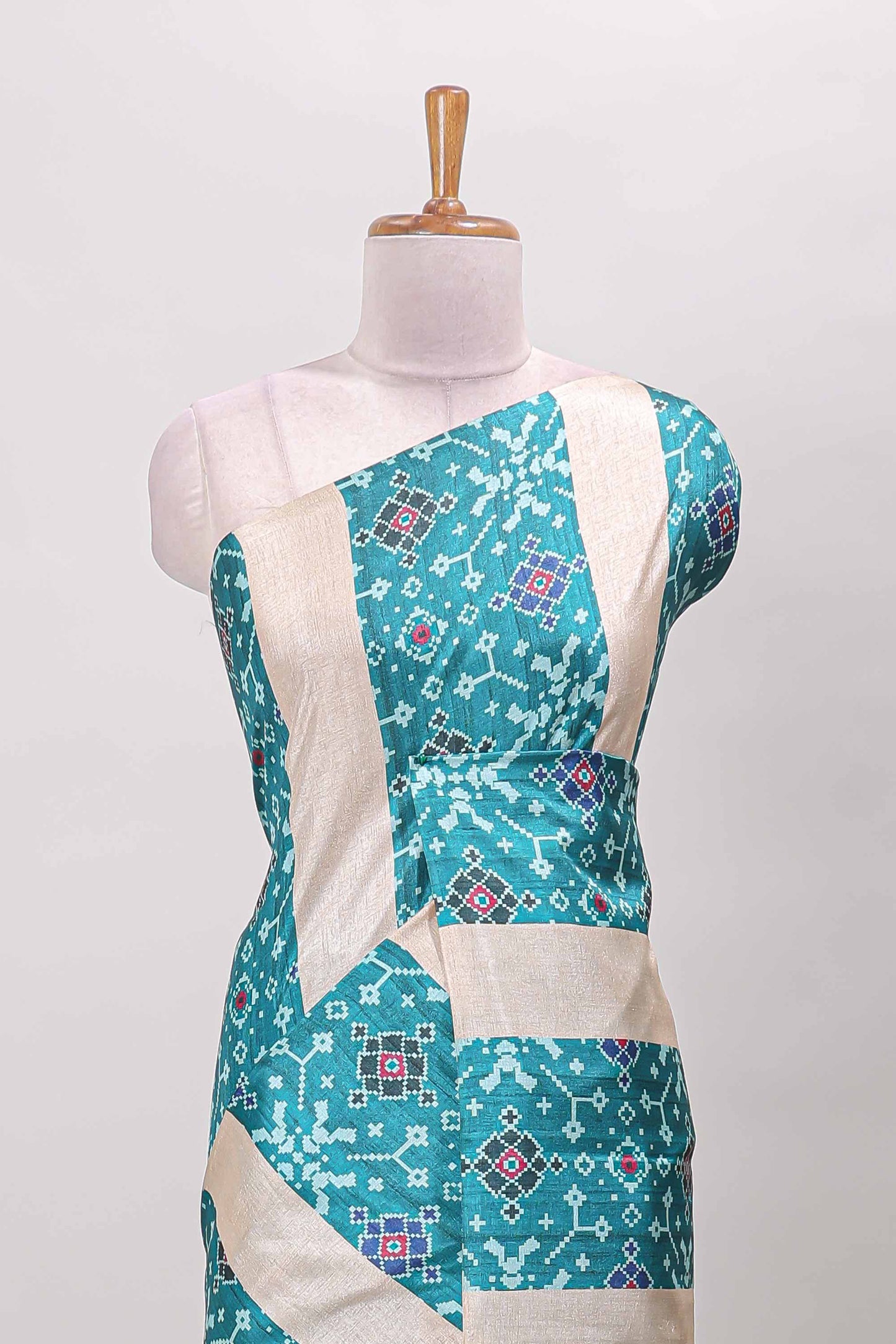 Borderless turquoise green block stripes ikkat style tussar saree with self pallu and matching blouse