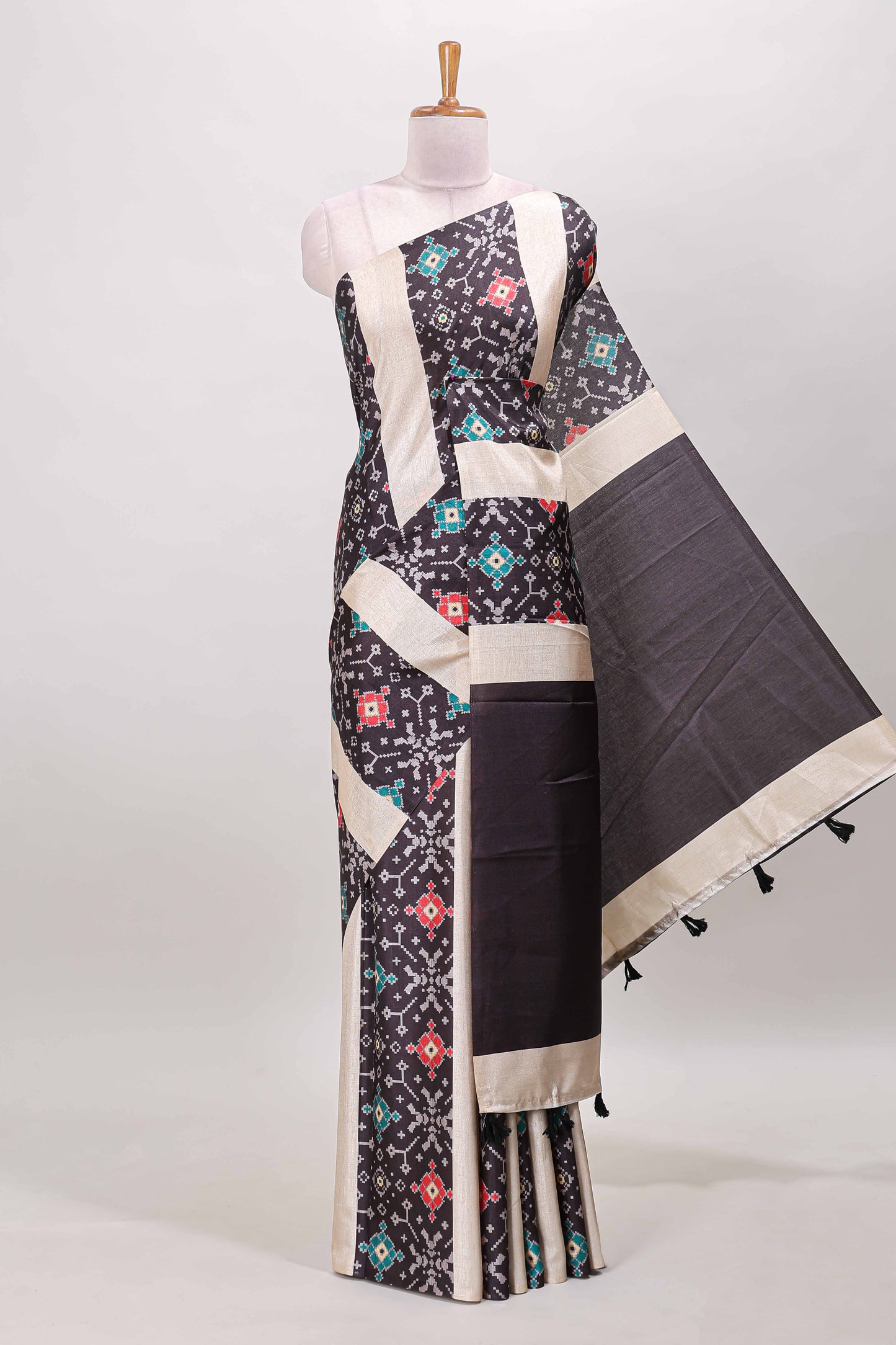 Borderless black block stripes ikkat style tussar saree with self pallu and matching blouse