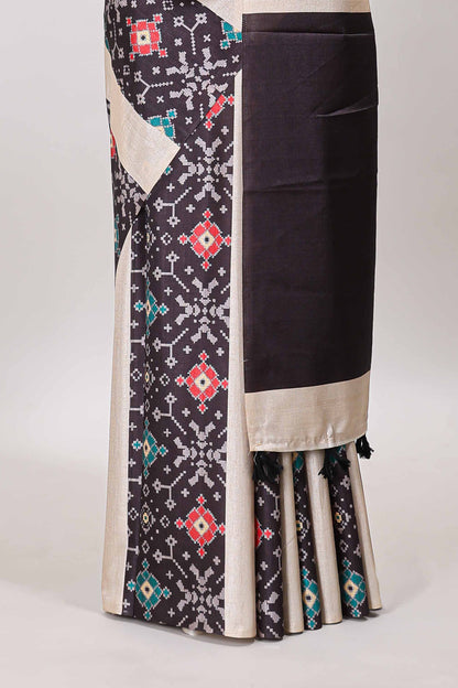 Borderless black block stripes ikkat style tussar saree with self pallu and matching blouse