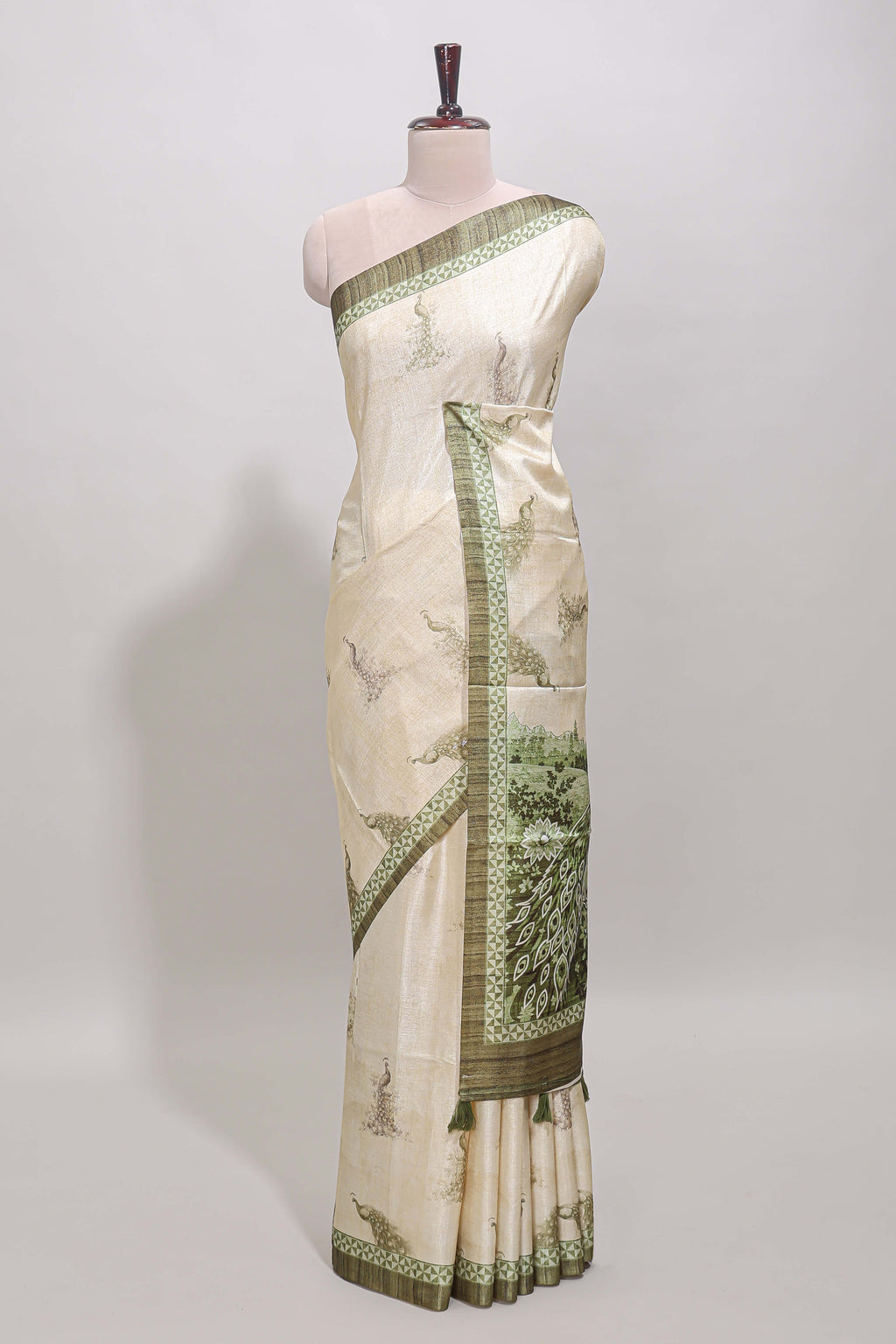 Cream peacock motifs tussar saree with contrast border and peacock printed pallu