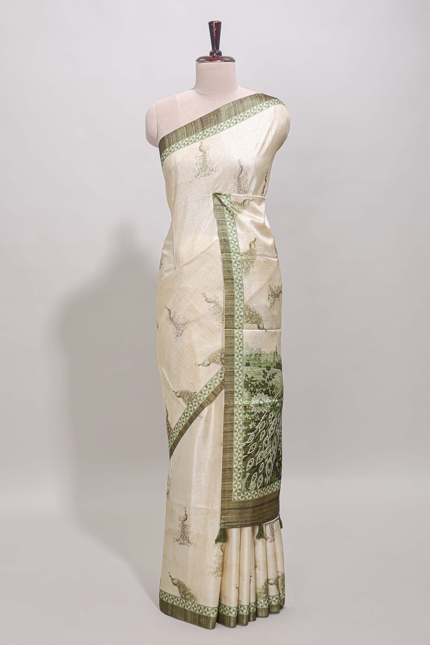 Cream peacock motifs tussar saree with contrast border and peacock printed pallu
