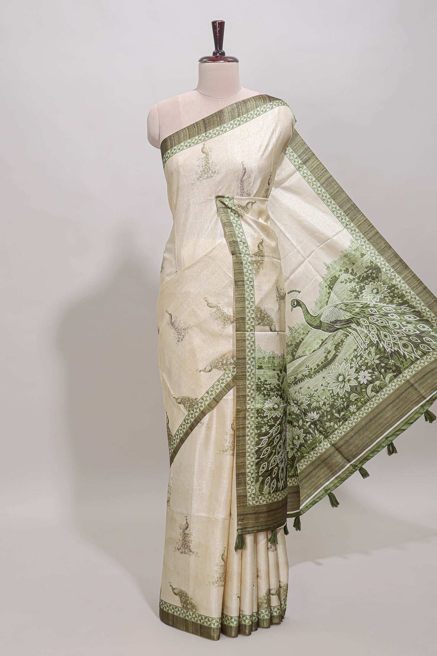 Cream peacock motifs tussar saree with contrast border and peacock printed pallu