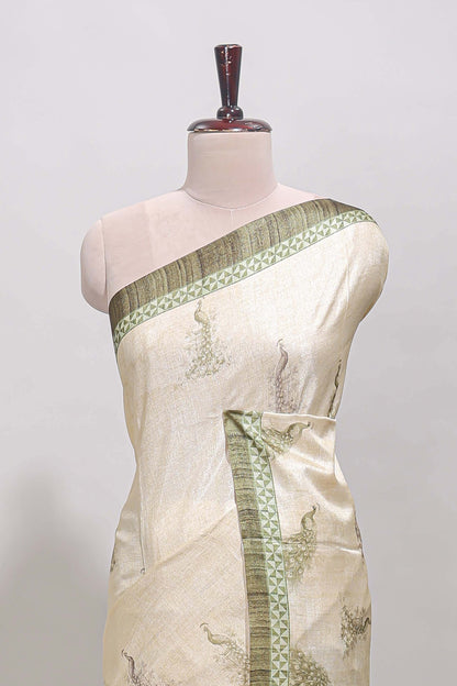 Cream peacock motifs tussar saree with contrast border and peacock printed pallu
