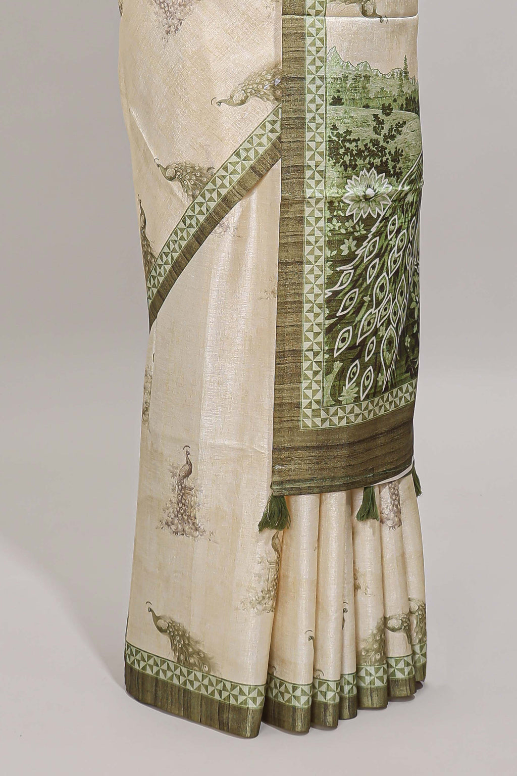 Cream peacock motifs tussar saree with contrast border and peacock printed pallu
