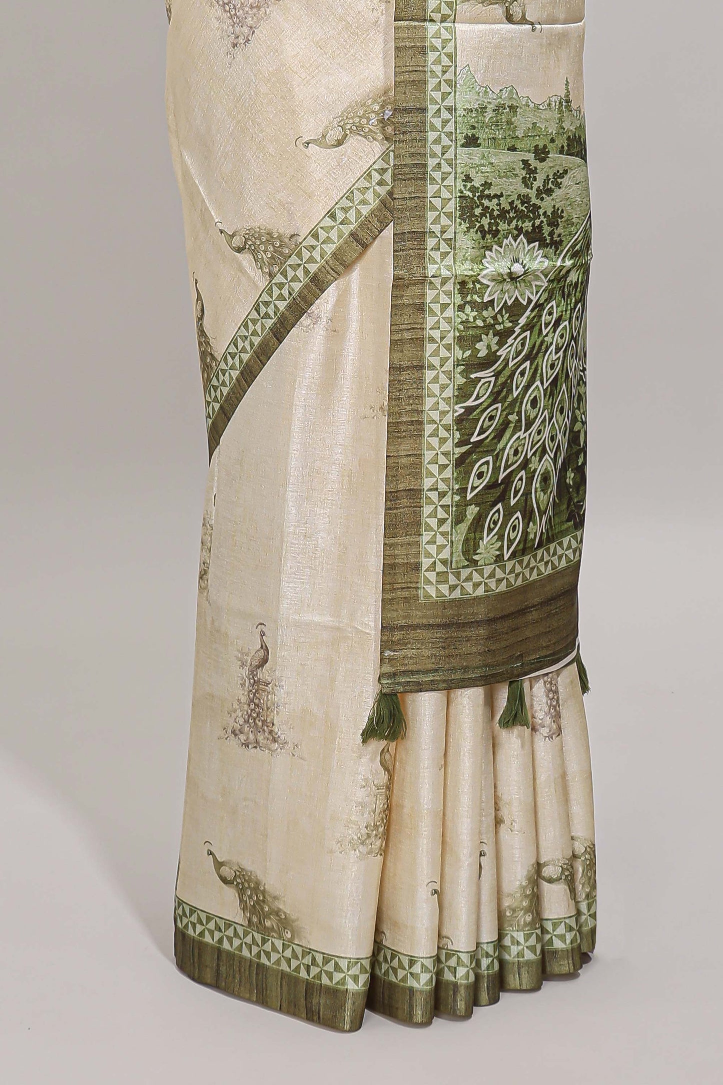 Cream peacock motifs tussar saree with contrast border and peacock printed pallu