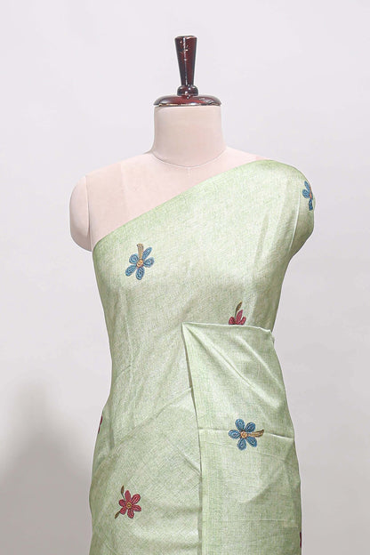Borderless green floral motifs art tussar saree with matching blouse and floral design pallu