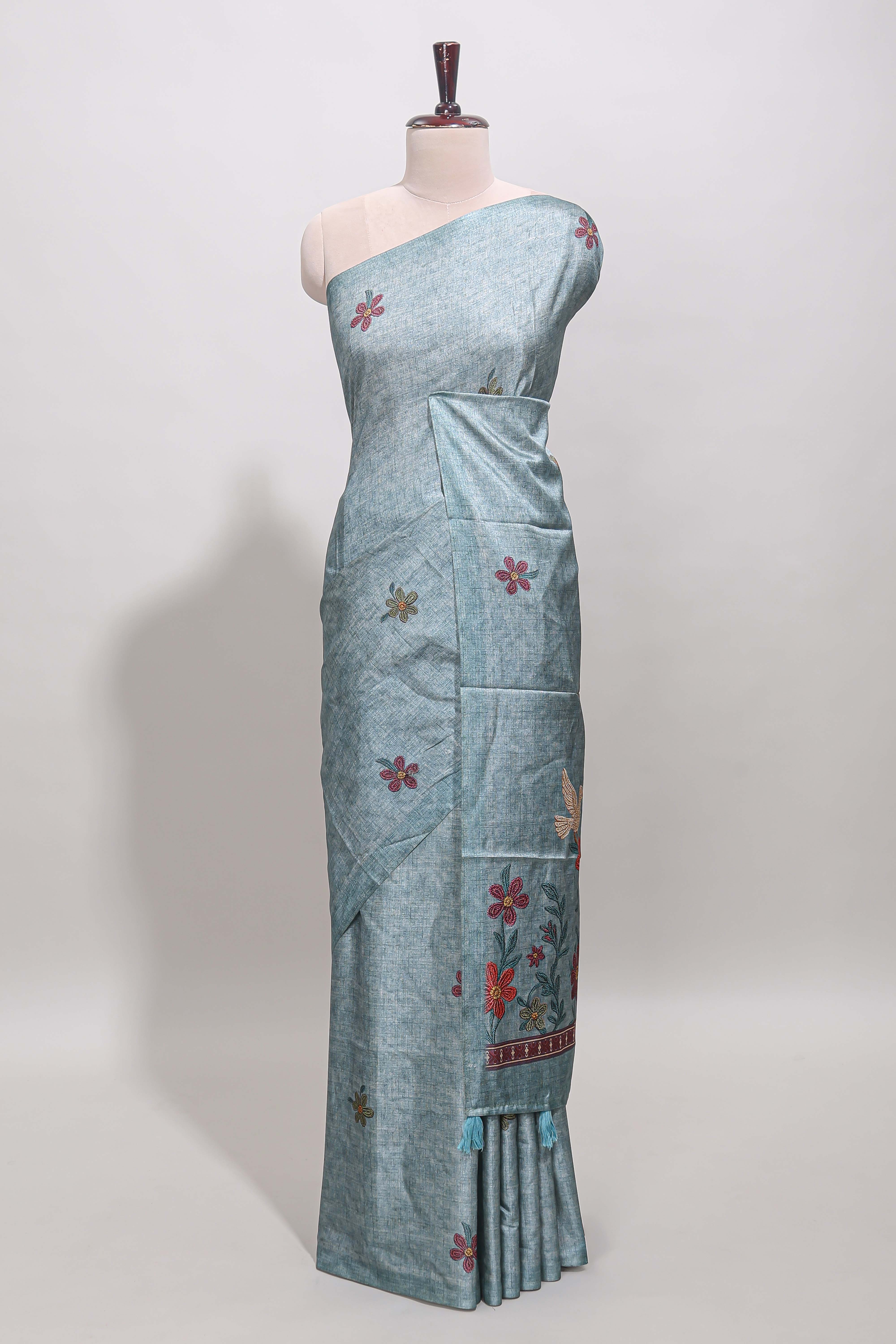 Borderless blue floral motifs art tussar saree with matching blouse and floral design pallu