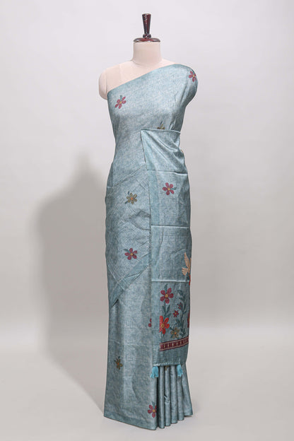 Borderless blue floral motifs art tussar saree with matching blouse and floral design pallu