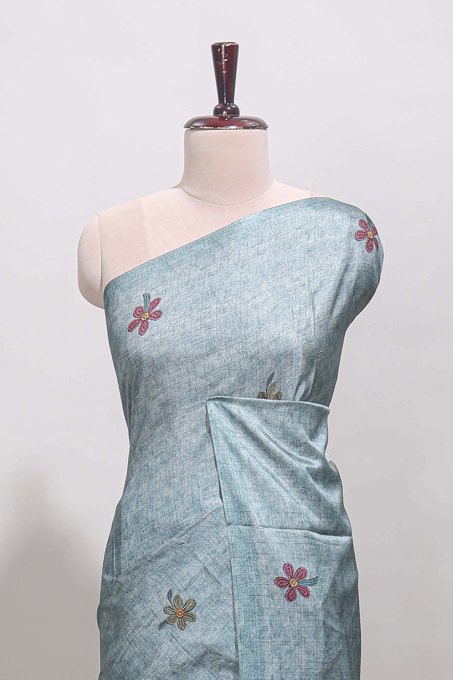 Borderless blue floral motifs art tussar saree with matching blouse and floral design pallu
