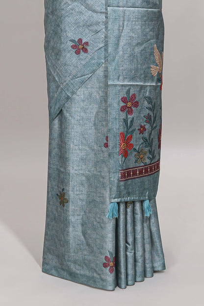 Borderless blue floral motifs art tussar saree with matching blouse and floral design pallu