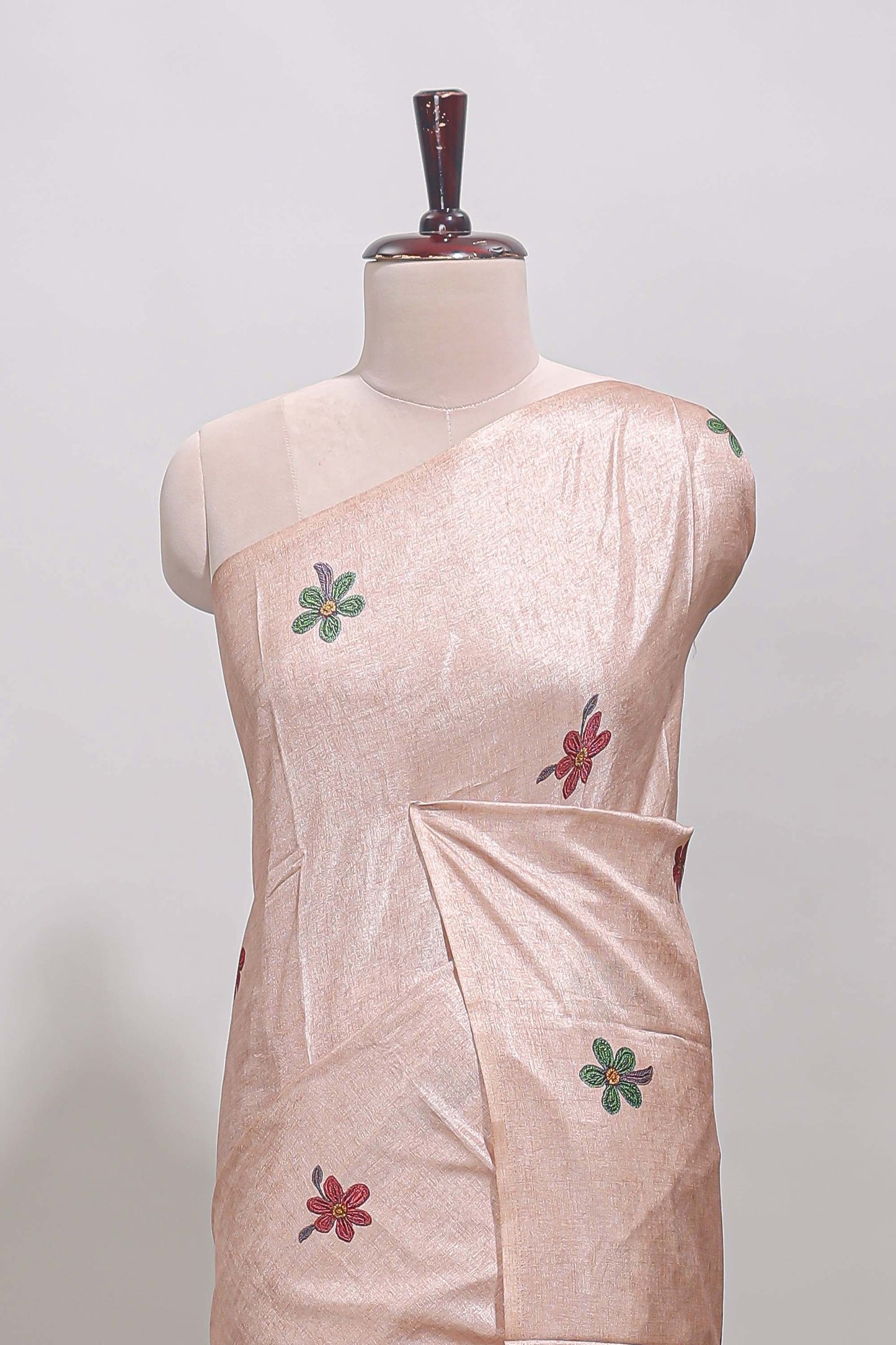 Borderless beige floral motifs art tussar saree with matching blouse and floral design pallu