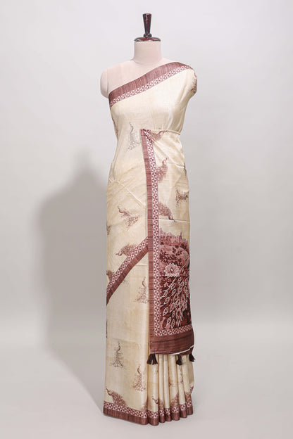 Cream peacock motifs tussar saree with contrast brown border and peacock printed pallu