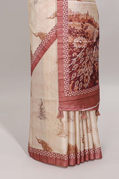 Cream peacock motifs tussar saree with contrast peach border and peacock printed pallu