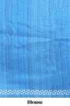 Cream peacock motifs tussar saree with contrast blue border and peacock printed pallu