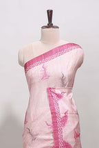 Cream peacock motifs tussar saree with contrast pink border and peacock printed pallu