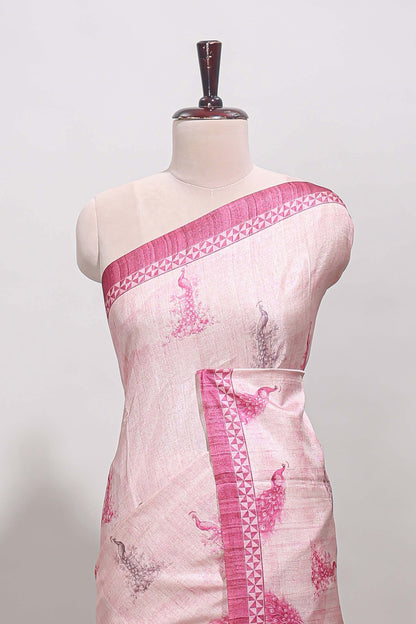 Cream peacock motifs tussar saree with contrast pink border and peacock printed pallu