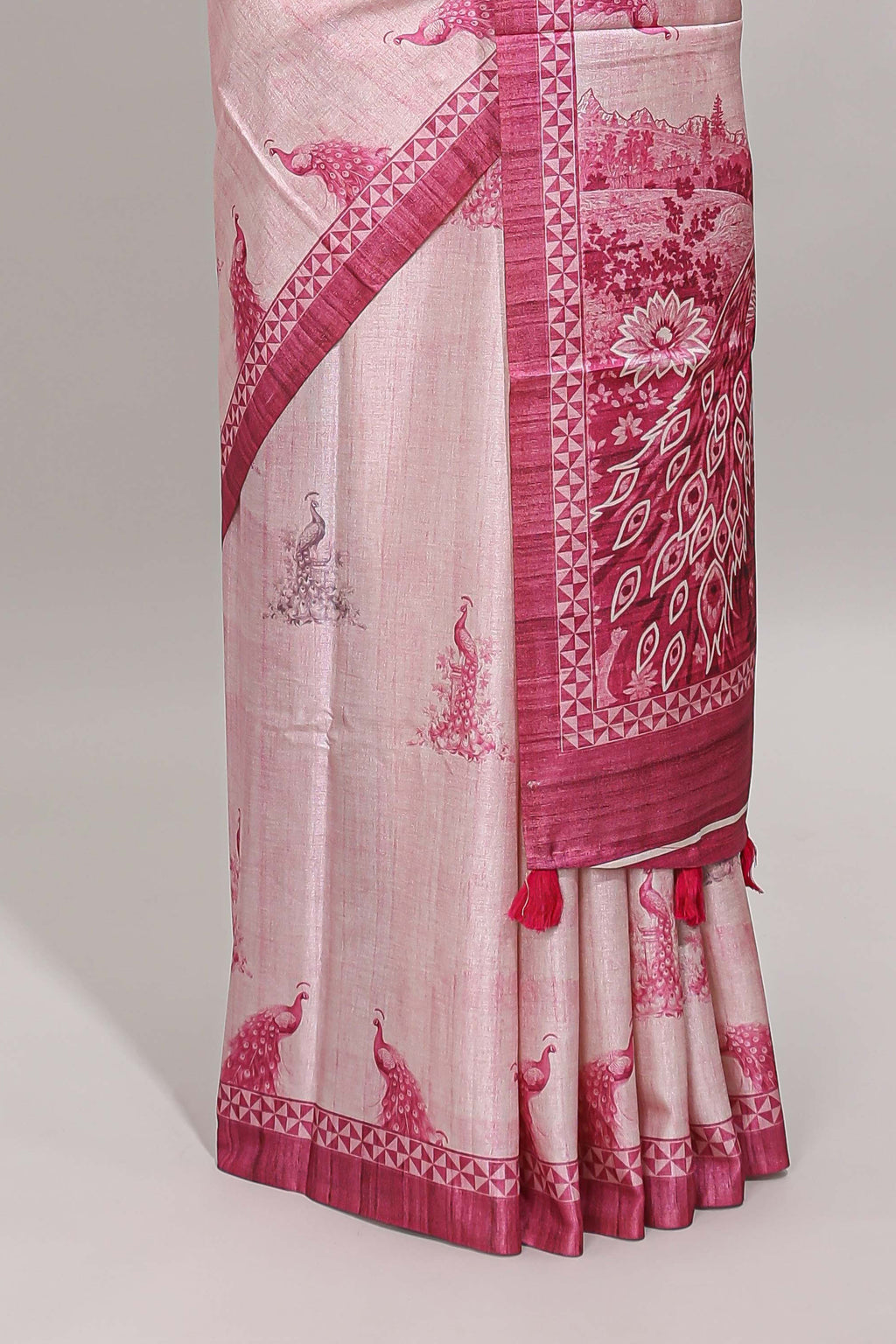 Cream peacock motifs tussar saree with contrast pink border and peacock printed pallu