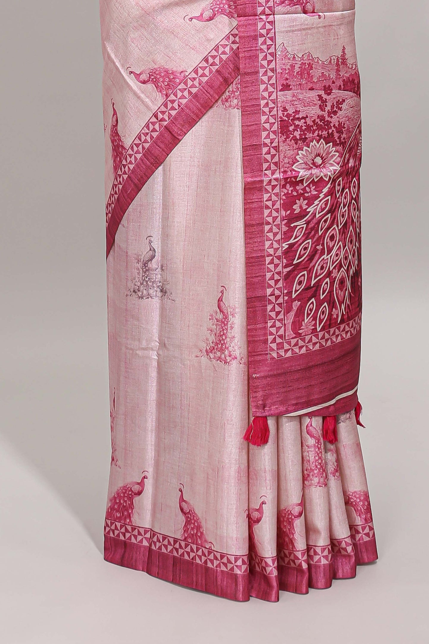 Cream peacock motifs tussar saree with contrast pink border and peacock printed pallu