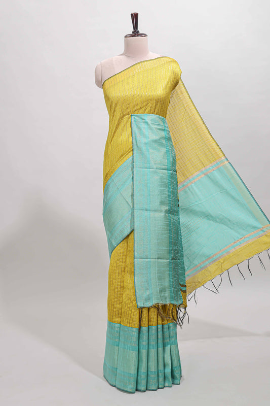 Yellow checked tussar saree with contrast blue zari border and checked blouse