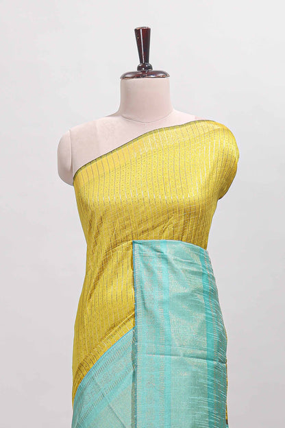 Yellow checked tussar saree with contrast blue zari border and checked blouse