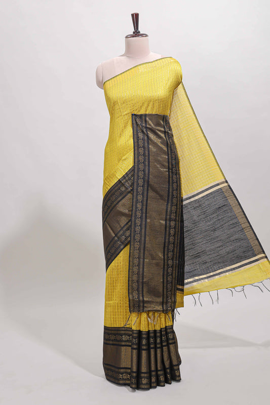 Yellow checked tussar saree with contrast black zari border and checked blouse