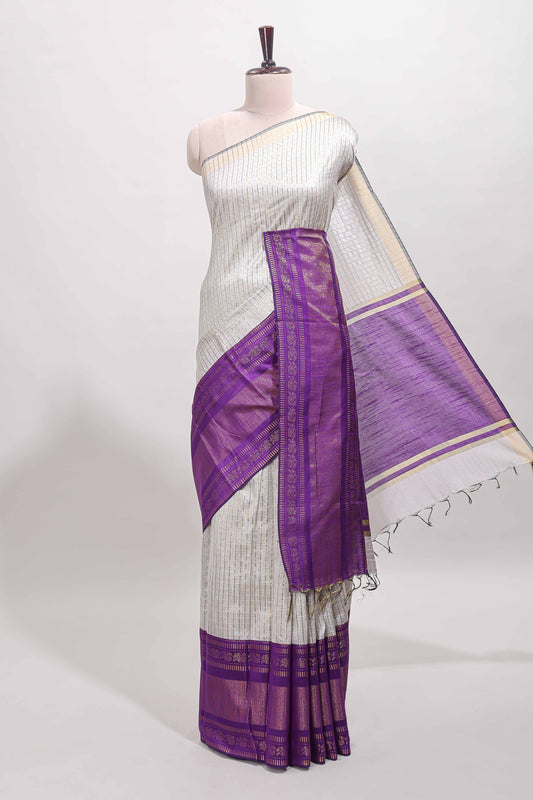 White checked tussar saree with contrast violet zari border and checked blouse