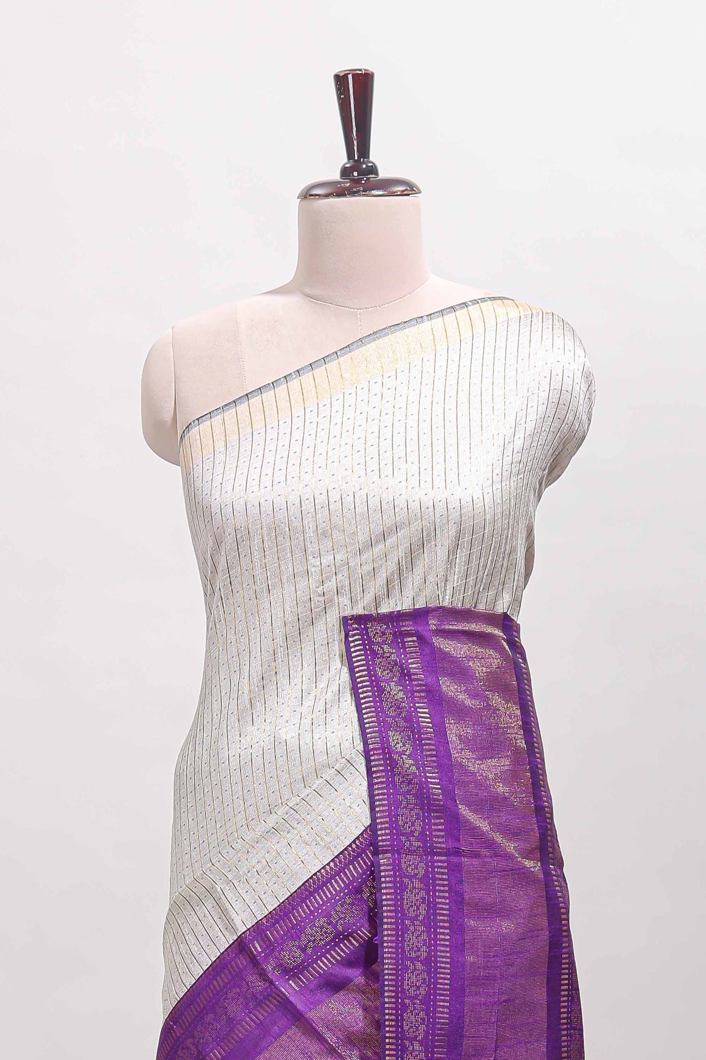 White checked tussar saree with contrast violet zari border and checked blouse