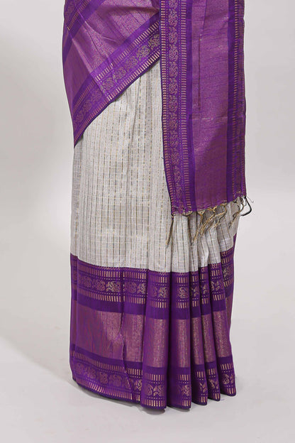 White checked tussar saree with contrast violet zari border and checked blouse