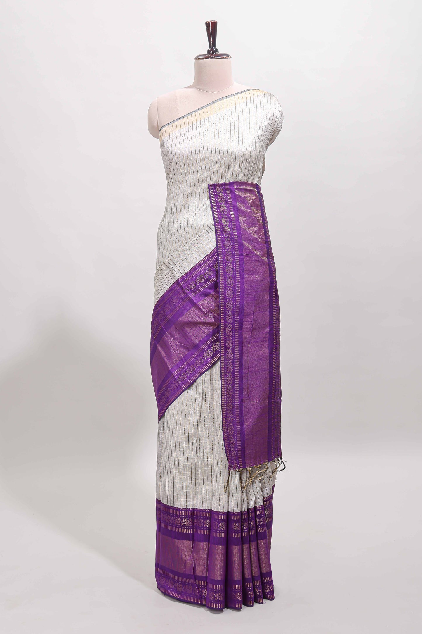 White checked tussar saree with contrast violet zari border and checked blouse