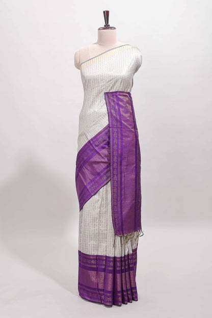 White checked tussar saree with contrast violet zari border and checked blouse