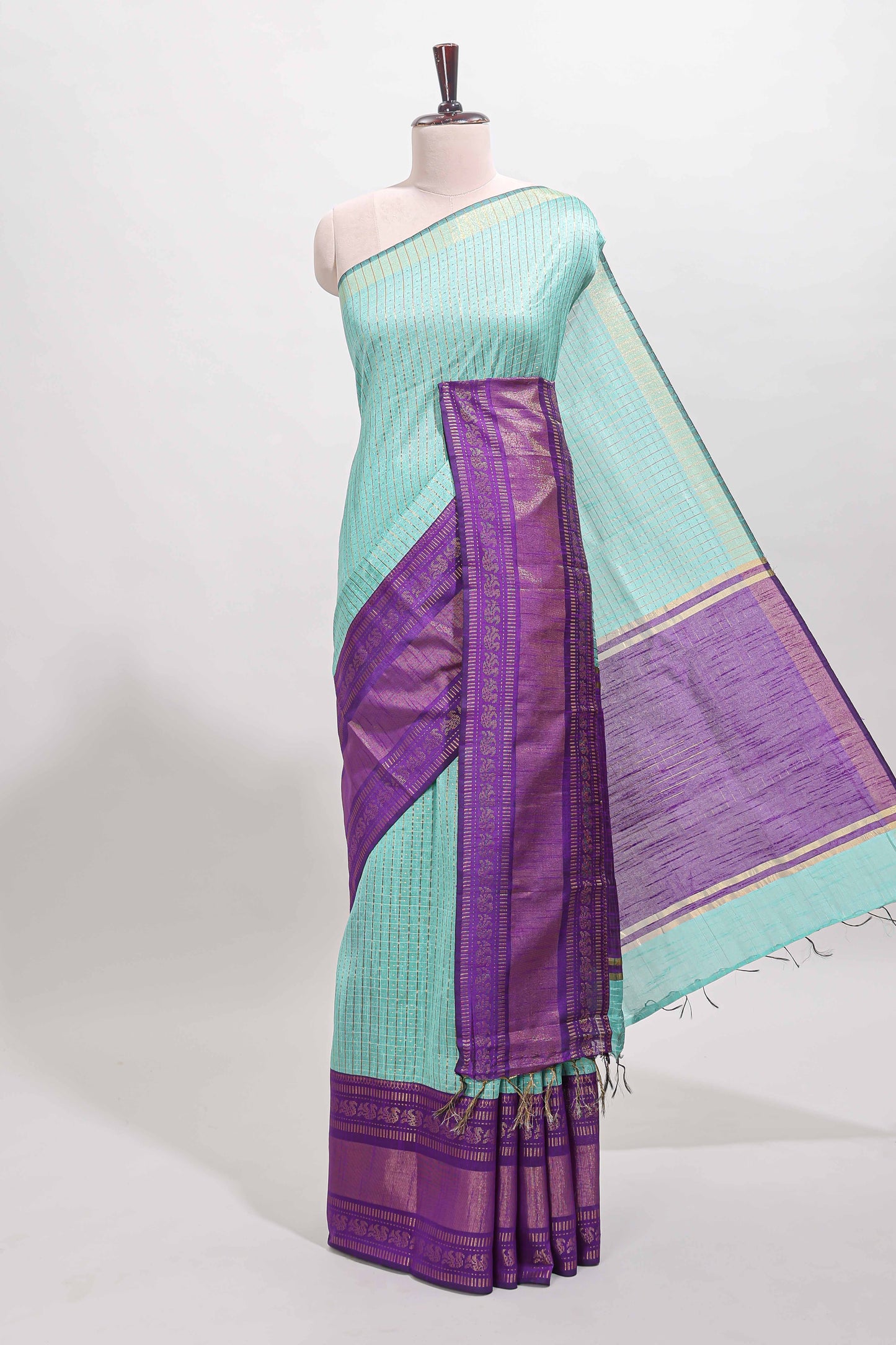 Blue checked tussar saree with contrast violet zari border and checked blouse