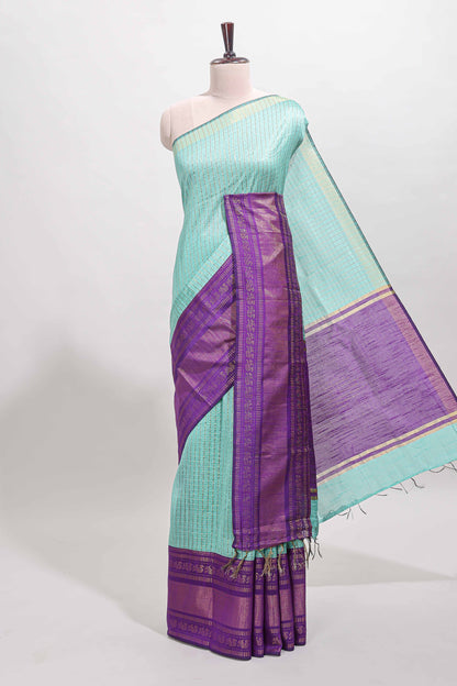 Blue checked tussar saree with contrast violet zari border and checked blouse